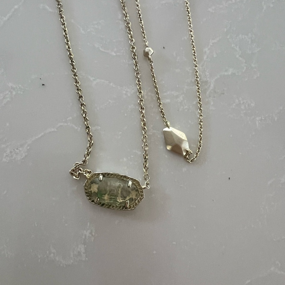Pair of Kendra Scott gold tone necklaces